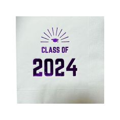 a white paper napkin with the class of 202 printed on it and purple lettering that reads class of 2054