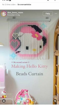 an image of a hello kitty bead pattern hanging on the wall