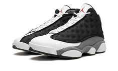 The Air Jordan 13 “Black Flint” is a clean and versatile colorway of the vintage basketball shoe that is loosely inspired by one of the model’s original releases.  The shoe in question is the Jordan 13 “Flint,” which was originally released in 1998 and one of the most popular colorways of Michael Jordan’s thirteenth signature shoe.  On the “Black Flint,” the shoe features the same color block as its predecessor, albeit in different colors.  The design is complete with a black mesh upper that’s c Jordan 13 Black Flint, Jordan 13 Flint, Tenis Jordan, Jordan Xiii, Original Air Jordans, Jordan 13 Black, Retro 13, Aztec Tattoo, Nike Fashion Shoes