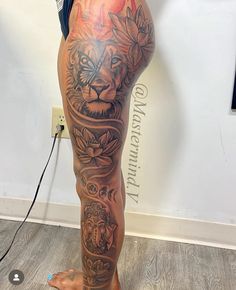 a person with tattoos on their legs