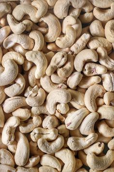 a pile of cashews sitting on top of each other