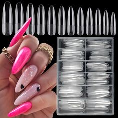 pink and white stiled nails with black dots on the tips are in a clear box