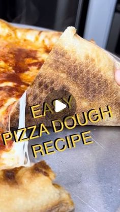 a person holding a slice of pizza with the words easy pizza dough recipe on it