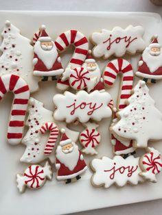 christmas cookies decorated with white and red icing