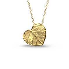 Elevate your style with our Italian 14k or 18k gold heart pendant and chain. Inspired by the beauty of nature, this exquisite heart pendant features a delicate leaf motif, infusing elegance and charm into every detail. Crafted with precision in Italy, this enchanting piece is a symbol of love and sophistication. A perfect accessory to cherish or to gift to someone special. 14k or 18k gold 20 mm high 20 mm large 18k Rolò chain chain length 45cm chain thickness 1.5mm designed and crafted in Italy Leaf-shaped Yellow Gold Necklace For Gift, Leaf-shaped Yellow Gold Necklace, Yellow Gold Leaf Necklace As Gift, Yellow Gold Leaf Necklace For Gift, Yellow Gold Leaf Shape Nature-inspired Jewelry, Elegant Yellow Gold Heart Necklace For Her, Elegant Sterling Silver Leaf-shaped Necklace, Elegant Engraved Yellow Gold Heart Necklace, Italian Engagement Ring