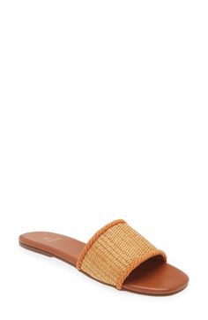 A woven raffia vamp enhances the sunny-day appeal of a minimalist slide sandal lined in soft leather and grounded by a slim rubber sole. Synthetic and textile upper/leather lining/rubber sole Imported Hispanic & Latinx Owned/Founded Chic Slip-on Slides With Woven Sole, Woven Synthetic Slides For Beach, Woven Synthetic Slides For The Beach, Synthetic Slides With Woven Sole For Summer, Beach Woven Synthetic Slides, Straw Open Toe Slides For Vacation, Straw Open Toe Slides With Textured Footbed, Straw Slides With Textured Footbed And Open Toe, Casual Natural Slides With Woven Sole