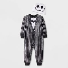 Whether it's a themed party, Halloween or any other occasion, your darling will look adorable as Jack Skellington with the Nightmare Before Christmas Jack Skellington Blanket Sleeper with Hat. This blanket sleeper showcases Jack Skellington's black-and-white suit on the onesie and his face on the hat for a creepy-cute look. It comes with ribbed cuffs and hem for a snug fit. Crafted from soft fabric, this blanket sleeper helps keep them comfortable, and its front half-length zipper allows easy dr Jack Skellington Toddler Costume, Jack Skellington Blanket, Jack Skellington Pajamas, The Nightmare Before Christmas Jack, Blanket Sleeper, Black And White Suit, Disney With A Toddler, Christmas Jack Skellington, Footed Pajamas