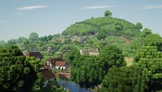 a small village on top of a hill surrounded by trees