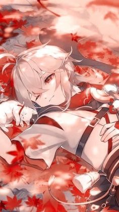 an anime character laying on the ground with red leaves around her and one arm outstretched