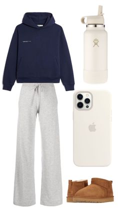 an iphone case, hoodie and sweatpants are arranged in front of the phone