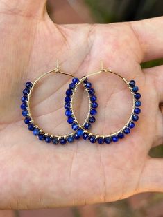 14K Gold Filled Lapis Lazuli Gemstone Hoops Earrings honestly, pictures and videos do not do these earrings justice! they are so glimmery ❤️ These earrings are hypoallergenic because they are gold filled (not plated)! Please read below to learn more about the difference between gold filled and gold plated 🤩 The earrings are approximately 1.5 inch  "How is gold-filled better than gold-plated?" Gold FILLED: 100 layers of gold, tarnish free, hypoallergenic, can wear in water, will last a lifetime if cared for, less affordable. Nickel Free 14k Gold-filled Blue Jewelry, Blue 14k Gold Filled Nickel-free Jewelry, Blue 14k Gold-filled Nickel-free Jewelry, Nickel-free 14k Gold-filled Blue Jewelry, Blue Hypoallergenic Hoop Jewelry, Hypoallergenic Blue Hoop Jewelry, Handmade 14k Gold Filled Blue Earrings, Handmade Blue 14k Gold Filled Earrings, Handmade Blue 14k Gold-filled Earrings