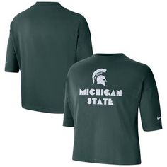 Handle warm weather game days in style with this Michigan State Spartans Crop T-shirt from Nike. This tee features Dri-FIT technology that keeps you cool and comfortable as you cheer your team to victory. This crop top is oversized for a cozy, loose fit, making it a perfect casual option for the big game. Screen print graphics Cropped design Officially licensed Brand: Nike Machine wash with garment inside out, tumble dry low Material: 57% Cotton/43% Polyester Crew neck Imported Short sleeve Dri- Nike Collegiate Tops With Letter Print, Nike Short Sleeve Tops For Fans, Nike Short Sleeve Fan Apparel Top, Nike Green Graphic Tee, Nike Green Tops With Logo Print, Nike Green Top With Logo Print, Nike Crew Neck Top With Text Print, Nike Short Sleeve Top With Text Print, Nike Tops With Letter Print And Relaxed Fit