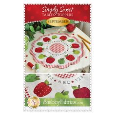 a table cloth with apples on it and the words simply sweet written in red ink