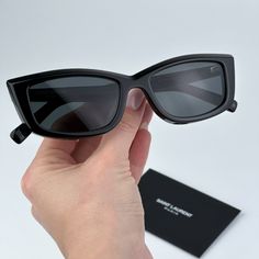 Saint Laurent Sl658 001 Brand New Sunglasses Black Rectangle Unisex Brand New And 100% Authentic! Made In Italy. Same/Next Day Shipping! Brand: Saint Laurent Model: Sl658 Color Code: 001 Gender: Unisex Frame Colour: Black Frame Shape: Rectangle Frame Style: Full Rim Frame Material: Recycled Acetate Lens Color: Black Lens Material: Bio Nylon Size: 54x17x145 100% Uv Protection Full Retail Saint Laurent Set Includes: 1. Glasses 2. Case 3. Cleaning Cloth 4. Authenticity Card/Certificate Designer Black Rectangular Sunglasses, Black Square Sunglasses For Parties, Black Square Sunglasses For Party, Modern Black Rectangular Sunglasses, Luxury Black Rectangular Sunglasses, Saint Laurent Sunglasses, Sunglasses Women Oversized, New Sunglasses, Rectangle Frame