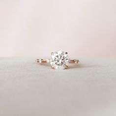 an engagement ring with two diamonds on it