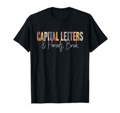 a black t - shirt with the words capital letters and friends brush in multicolors