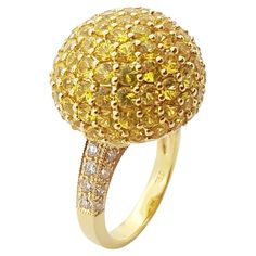 Yellow Sapphire 7.06 carats with Brown Diamond 0.55 carat Ring set in 18 Karat Gold Settings Width: 1.9 cm Length: 1.9 cm Ring Size: 51 Total Weight: 11.81 grams "We first opened doors in 1980 when it was then situated in the vicinity of the Victory Monument; a small and modest storefront with a couple of counters. From its humble beginnings to where it stands today, our company has proven its abilities as a jeweler. Since the beginning, we have been supplying fine quality pieces to dealers, who