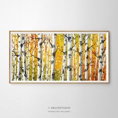 an art piece with yellow and white trees in the background, hanging on a wall