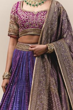 Light purple crushed lehenga with gota texturing.  Comes with mukaish embroidered blouse enhanced with aari-sequin work, French knots and meenakari brocade dupatta highlighted with kasab and kundan embllishments. 
Component: 3
Embroidered
Neckline: U Neck
Sleeve Length: Half
Fabric: Brocade, Chanderi
Color: Purple
Tassel tie-up back
 - Aza Fashions Pink Raw Silk Lehenga, Brocade Dupatta, Chanderi Lehenga, Brocade Embroidery, Raw Silk Lehenga, Tarun Tahiliani, Indian Aesthetic, Embroidered Neckline, Embroidery Blouse