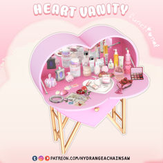 a pink heart shaped table with lots of items on it and the words, heart vanity