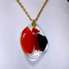 Gorgeous Handmade Free Form Pendant Alit With Fused Reds Blacks And White Suspended In Smooth Clear Glass. Comes With Lovely Gold Chain. Truly One Of A Kind Pendant: 2 Inches See Also Last Photo For Length... Modern Red Necklace For Party, Red Necklace With Large Pendant For Gifting, Unique Red Necklace With Large Pendant, Elegant Orange Resin Jewelry, Red Round Pendant Necklace, Red Necklace With Large Round Pendant, Red Necklace With Round Pendant, Unique Red Round Pendant Necklace, Red Necklace With Large Pendant For Formal Occasions