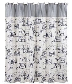 a shower curtain with horses and trees on it