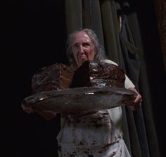 an old man holding a large piece of cake in front of his face with the words, every time i eat chocolate cake i think of matilda 80 / 90's kid problems