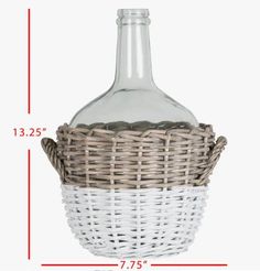 a white and brown basket with a bottle in it