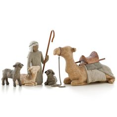 a nativity scene with figurines and sheep