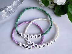 Handcrafted beaded bracelet. Customized with your choice of name or word and choice of color. Made with glass beads and acrylic letter beads.  Wear it alone or stack them with other bracelets.  It is a perfect addition to any wardrobe. Great gift idea!  If you are buying it as a gift the standard size is 7".  How to measure for a bracelet... Wrap a measuring tape around your wrist at the point where you want to wear the bracelet. If you don't have a flexable measuring tape, use a piece of string, or strip of paper, mark the length, and measure it with a ruler.  Now make sure you add 1/2" to your measurement. Women's Extra Small: 6.5 inches Women's Small: 6.75 inches Women's Standard: 7 Inches Women's Medium: 7.25 Inches Women's Large: 7.5 Inches 🌸Thank you for visiting my shop and don't h Customizable Green Beaded Bracelets, Green Name Bracelet With Letter Beads, Friendship Name Beaded Bracelets With Round Beads, Friendship Beaded Bracelet With Name, Personalized Green Beaded Bracelets With Letter Beads, Friendship Beaded Bracelets With Name, Trendy White Beaded Bracelets With Name, Purple Name Bracelet With Letter Beads, Acrylic Letters