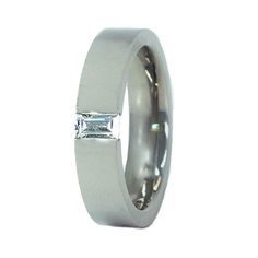 Modern flair! Moderna is a conservative baugette tension gemstone setting ring Can be set with several different gemstone choices The strength of titanium securely holds a rectangle cut gemstone with pleasing clean lines When you want to wear a low profile band but still have that extra special aspect! Manufacturing Time: 7 Business Days Ring Width Shown: 5mm Gemstone in the Picture: 5 x 2.5mm Baguette cut White Cubic Zirconia Rings Casual, Gemstone Setting, Jewellery For Men, Casual Rings, Titanium Jewelry, Titanium Ring, Titanium Rings, Baguette Cut, Custom Rings