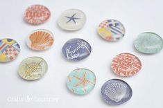 six seashells with starfish and shells painted on them