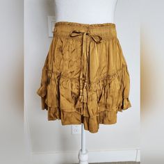 Aerie Marigold Satin Skirt, Size Juniors Medium Elastic Waist Approx Measurements: Waist: 14, But Stretchy Length From Top To Bottom Hem: 16 Spring Beach Gold Bottoms, Casual Gold Skirt For Summer, Gold Lined Mini Skirt For Spring, Casual Gold Skirt For Spring, Casual Gold Skirt, White Ruffle Mini Skirt, Layered Ruffle Skirt, Light Blue Plaid, Ruffled Mini Skirt