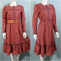 Vintage red plaid western style prairie dress with a ruffled skirt. Lace collar and cuffs, ribbon accents.  Cute flower buttons up the front. Elastic waist, ruffled hemline. Lightweight fabric, likely cotton/poly. Red, green, white small plaid.  LABEL: Candi Jones California.  CONDITION: Very good, clean and ready to wear.  SIZE:  Refer to measurements for an accurate fit. All sizes are approximate. Shoulder: 13 3/4" Underarm: 37" Sleeve: 23 1/2" Waist: 22-28" stretches Hip: free Length: 43" Man Fitted Prairie Dress With Ruffles For Fall, Daywear Plaid Dress With Ruffles, Retro Prairie Dress For Fall, Fall Prairie Dress With Ruffles, Fall Gingham Plaid Dress With Ruffles, Vintage Prairie Dress With Ruffles For Fall, Fitted Prairie Dress In Cottagecore Style For Fall, Fitted Prairie Dress With Ruffles, Cotton Prairie Dress With Ruffles For Fall