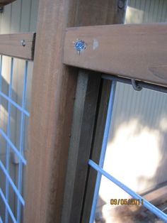 a close up of a window with bars on it