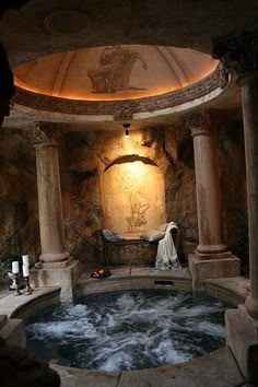 an indoor hot tub is shown in the middle of a room with columns and pillars