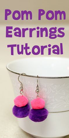 pom pom earrings with text overlay that says pom pom earrings