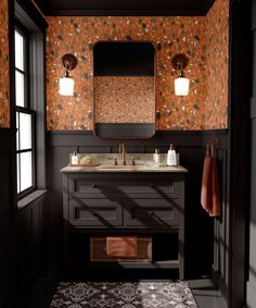 a bathroom with an orange wallpaper and two sinks in the center, along with a rug on the floor