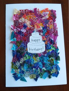 a birthday card made out of colorful fabric