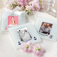 three frames with pictures and flowers on a table