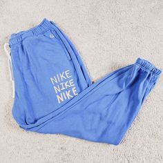 There's a light atain on the front near the knee area. Athleisure Sporty streetwear Blue Athleisure Joggers For Loungewear, Blue Joggers For Loungewear Athleisure Style, Nike Sweatpants For Sports, Blue Moisture-wicking Sweatpants For Loungewear, Nike Moisture-wicking Joggers For Streetwear, Nike Moisture-wicking Sweatpants For Sports, Light Blue Athleisure Bottoms For Loungewear, Light Blue Relaxed Fit Casual Sweatpants, Cotton Sports Bottoms