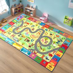 a child's play area with toys on the floor and children's rug