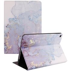 an ipad case with a blue and purple marble design on it, sitting next to another one