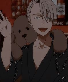 an anime character holding two teddy bears in his arms and giving the peace sign with both hands