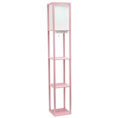 a pink shelving unit stands against a white wall with a light on it's side