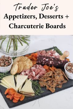 an assortment of cheeses, meats and crackers on a platter with text overlay that reads trader joe's appetizers, desserts + charlotteie boards