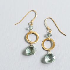 Beautiful green amethyst drop earrings. - Made of .925 Italian fine Italian sterling silver - Earrings are made with French Hooks. (we always include rubber safety backs) - These earrings are 1.5 inches long. Whether for yourself or as a gift we package with extreme care in a gift box. Our jewelry is always made in the USA in our New York City studio. The unique natural shapes of gemstones make each pair one-of-a-kind. Follow us on INSTAGRAM www.instagram/parkenjewelry **SHIPPING We always offer Gemstones Earrings, Green Amethyst Earrings, Real Green, Gemstone Drop Earrings, Gemstone Earrings Gold, Beaded Earrings Patterns, Amethyst Gold, Pretty Green, Beaded Hoop Earrings