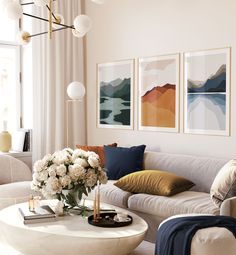 a living room filled with white furniture and lots of green accents on the walls,