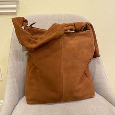 Nwt Leather Shell 100% Cotton Lining Cognac Textured Leather Shoulder Bag For On-the-go, Daily Use Cognac Shoulder Bag With Textured Leather, Brown Soft Leather Bucket Bag For On-the-go, Caramel Shoulder Bag With Removable Pouch For Everyday, Caramel Tote Shoulder Bag For Everyday, Brown Leather Crossbody Hobo Bag, Brown Hobo Shoulder Bag For On-the-go, Cognac Textured Leather Bucket Bag For Daily Use, Cognac Textured Leather Hobo Shoulder Bag