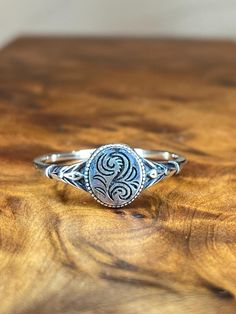 This sterling silver vintage style ring is a classic option for everyday wear. Works well with stackable styles as well. All of our rings are available in whole sizes only and are stamped with the .925 Hallmark, which is the international mark for sterling silver. .925 refers to the fact that sterling silver is an alloy, 92.5 parts silver to 100 parts metal. All of our jewelry is nickel free. Vintage Style Rings, Statement Ring Silver, Charleston Sc, Rings Statement, Statement Ring, Charleston, Silver 925, Halloween Shopping, Hallmark